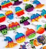 AMUHUA Christmas Party Favors for Kids - 24 Pack Mini Pop Fidget Keychain with Gift Cards for Toddler Kids Classroom Gifts Stocking Stuffers Treats