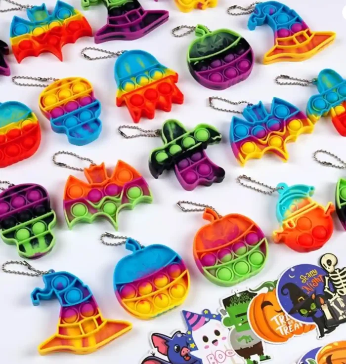 AMUHUA Christmas Party Favors for Kids - 24 Pack Mini Pop Fidget Keychain with Gift Cards for Toddler Kids Classroom Gifts Stocking Stuffers Treats - Image 1